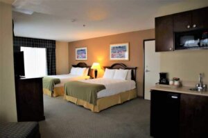 Spacious hotel room with two queen beds