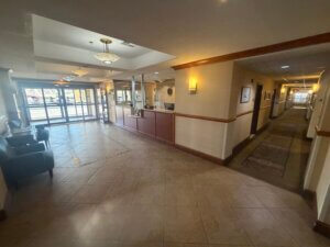 Hotel reception desk with long corridor