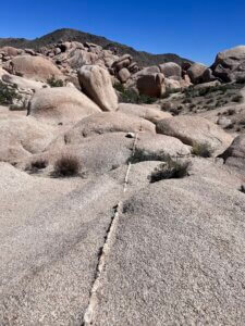 Granite boulder field under clear blue sky