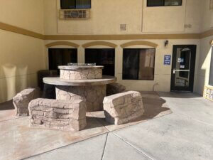Stone fountain and benches in courtyard