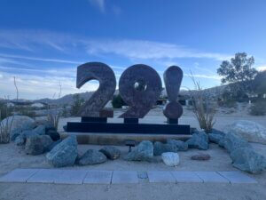 Rusty 29! sculpture in desert landscape